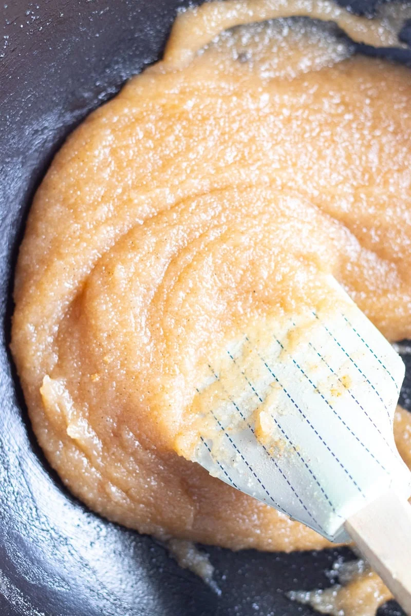 top down view of halwa in a wok. 