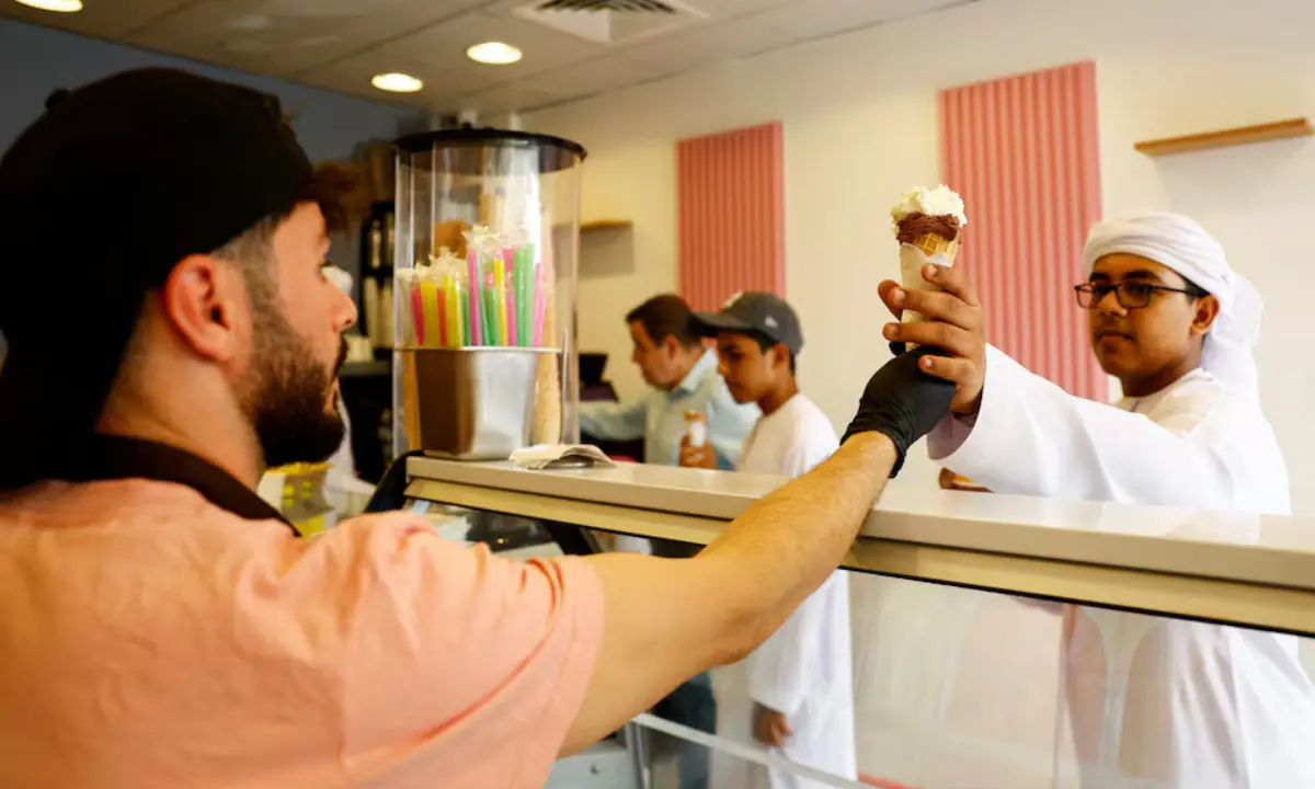  Customers buy ice cream at Kazem&rsquo;s new location in Ajman 
