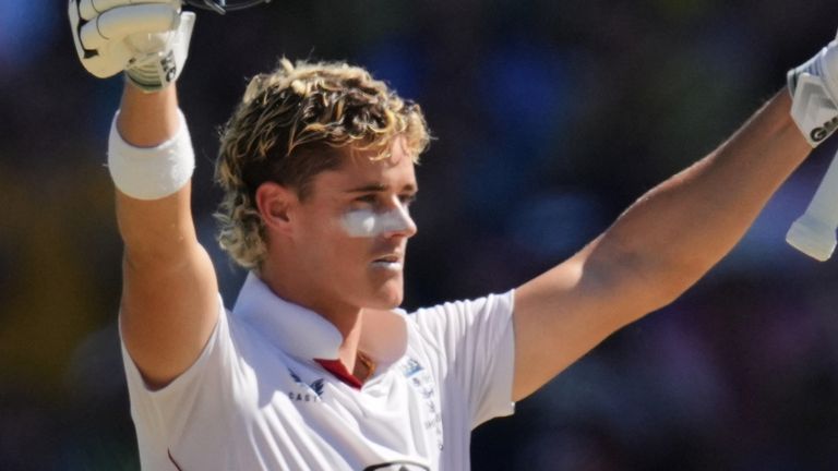 England's Jacob Bethell celebrates after scoring a century during play on day four of the fifth and final Ashes cricket test between England and Australia in Sydney, Wednesday, Jan. 7, 2026. (AP Photo/Mark Baker)