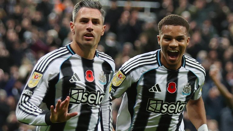 Fabian Schar (left) celebrates heading Newcastle 1-0 ahead against Spurs