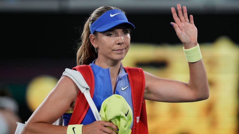 Katie Boulter of Britain waves as she leaves the court following her first round loss to Belinda Bencic of Switzerland at the Australian Ope