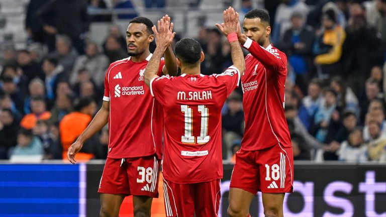 Liverpool's Cody Gakpo celebrates with Mohamed Salah and Ryan Gravenberch