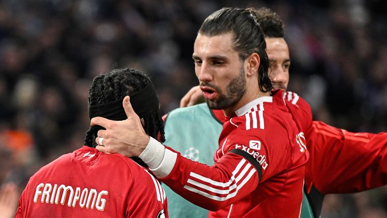 Dominik Szoboszlai celebrates with Jeremie Frimpong