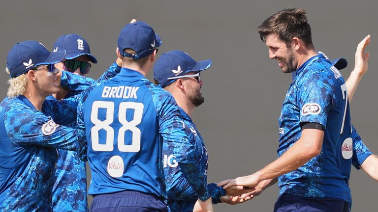England's Jamie Overton celebrates with teammates the wicket of Kamil Mishara during the second ODI between England and Sri Lanka