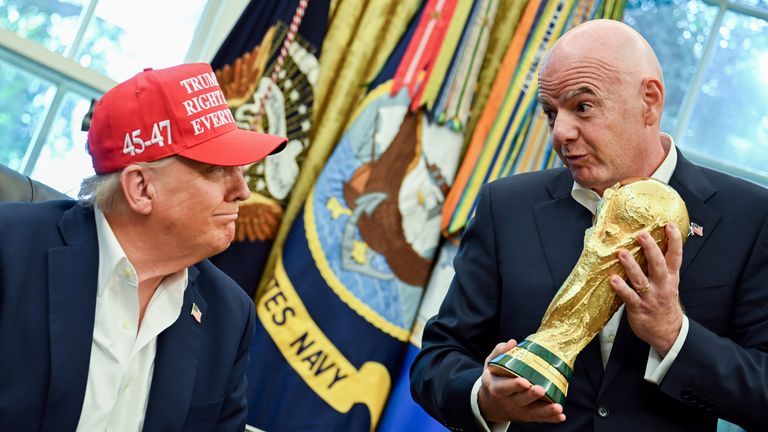 US President Donald Trump and FIFA chief Gianni Infantino with the World Cup trophy at the Oval Office of the White House