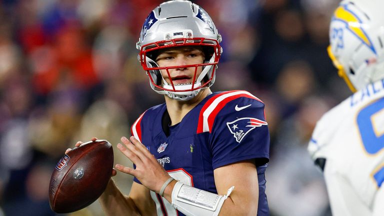 New England Patriots quarterback Drake Maye (10) makes a pass under pressure during the second half of an NFL wild card playoff football game against the Los Angeles Chargers, Sunday, Jan. 11, 2026, in Foxborough, Mass. (AP Photo/Greg M. Cooper)