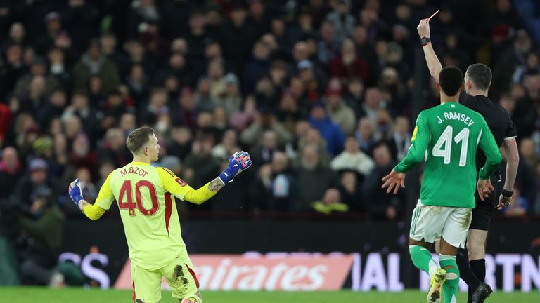 Aston Villa goalkeeper Marco Bizot is sent off for a wild challenge on Newcastle's Jacob Murphy
