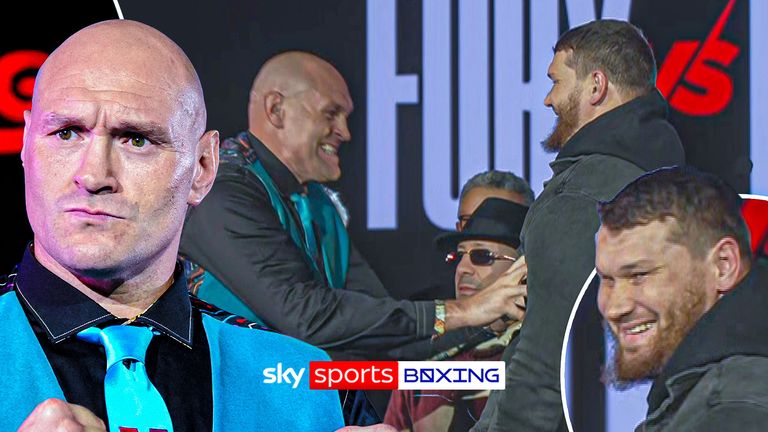 Tyson Fury tickles opponent in face off.