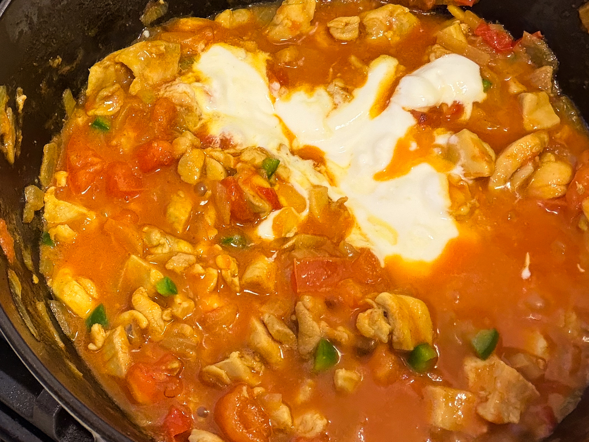 Whisked yogurt added to ginger chicken