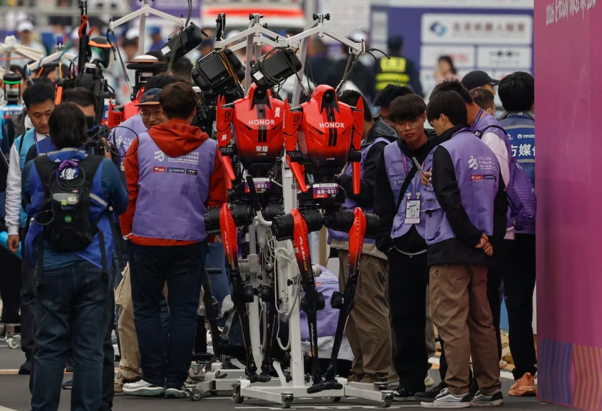 Humanoid robots by Honor are prepared ahead of the second Beijing E-Town Half Marathon and Humanoid Robot Half Marathon in Beijing, China April 19, 2026. REUTERS