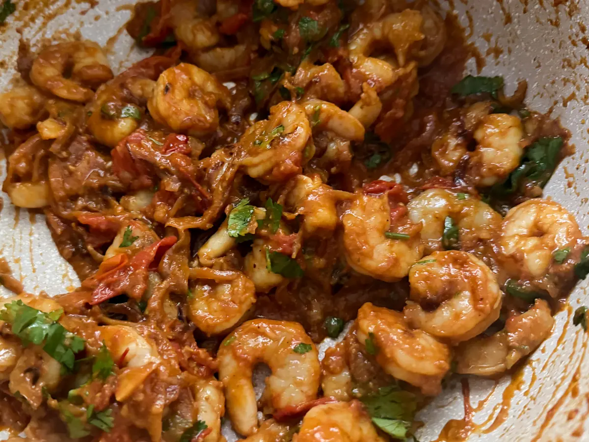 stir in the prawn and fry until no longer opaque