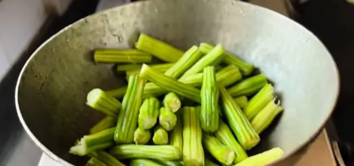 Cooking the moringa drumsticks 