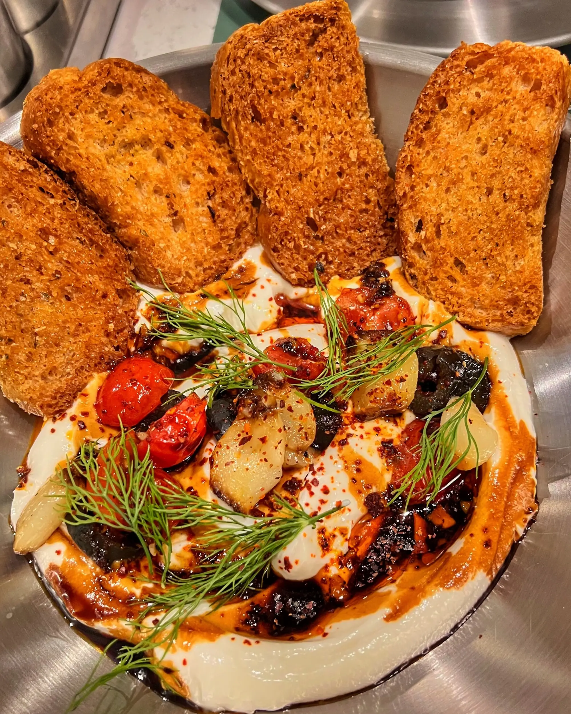 The chilli labneh with roasted garlic and dill